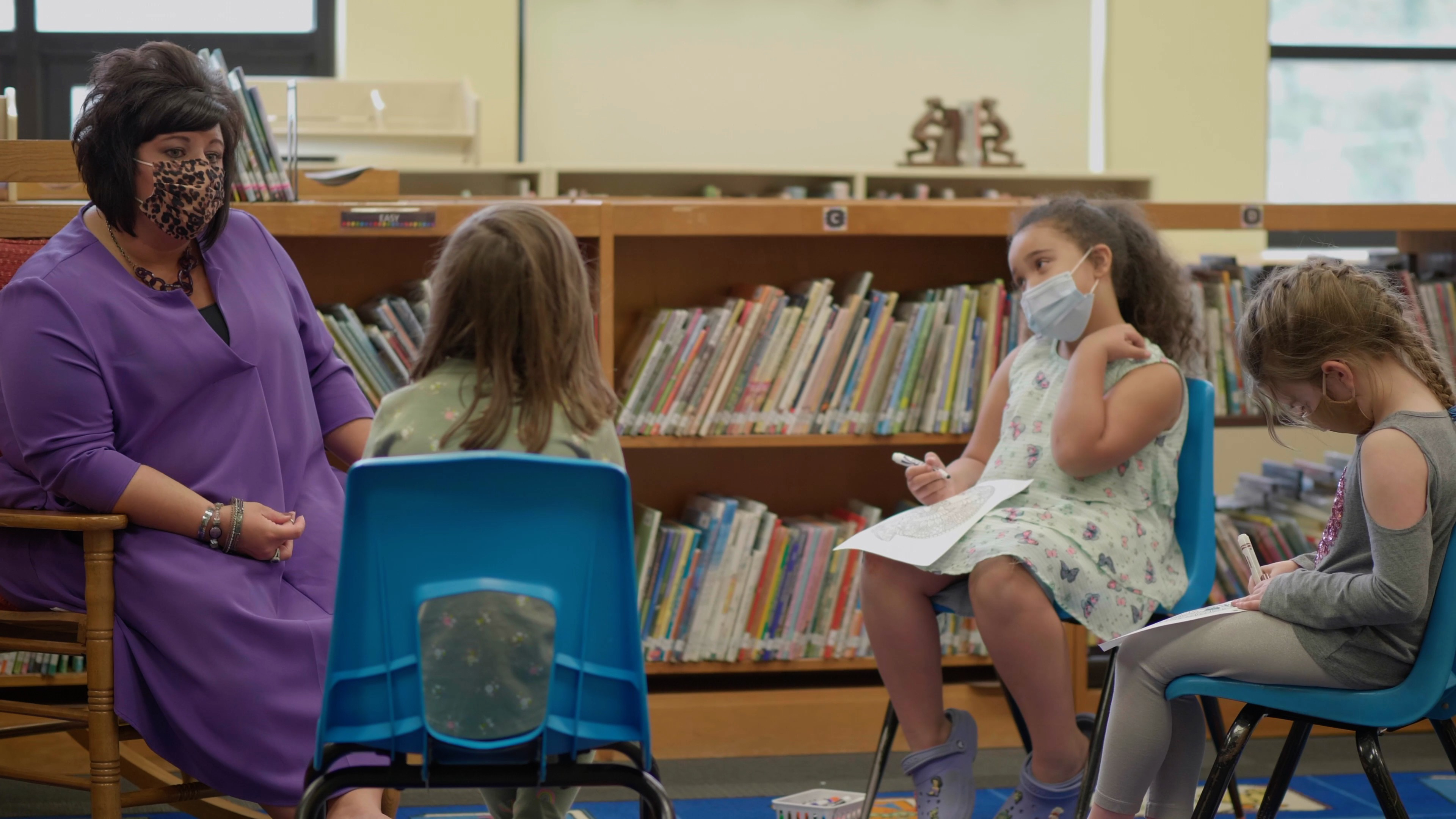 Mallory Jacobs, a school counselor works with a group of students at Whitson Elementary School, Topeka KS